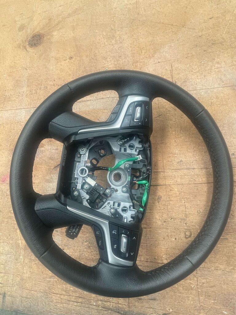 Robbos Custom Upholstery Auto Repair and Restoration